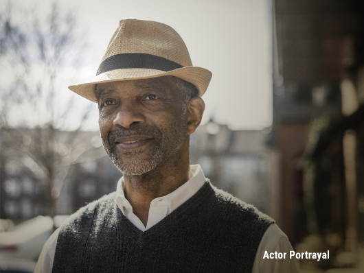 Older gentleman smiling. Actor portrayal